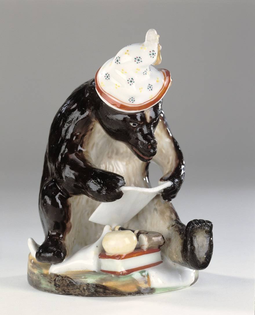 Bear Reading a Newspaper